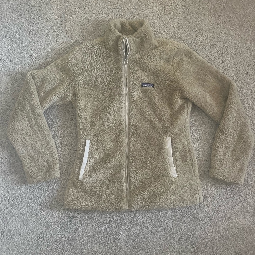 Patagonia fluffy zip up jacket with pockets.